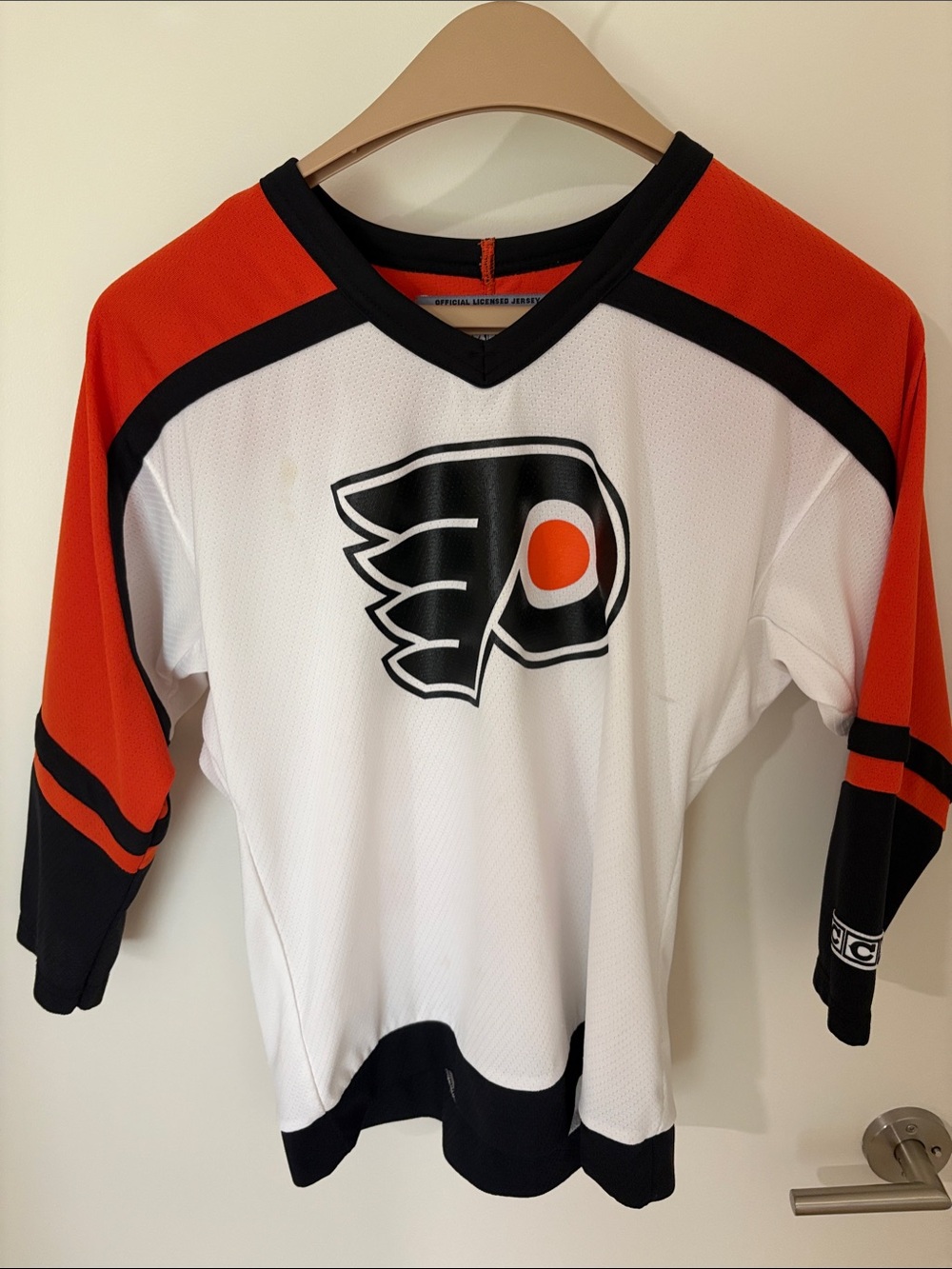 CCM Kids White, Orange & Black Hockey Jersey with Flyers-Inspired Crest